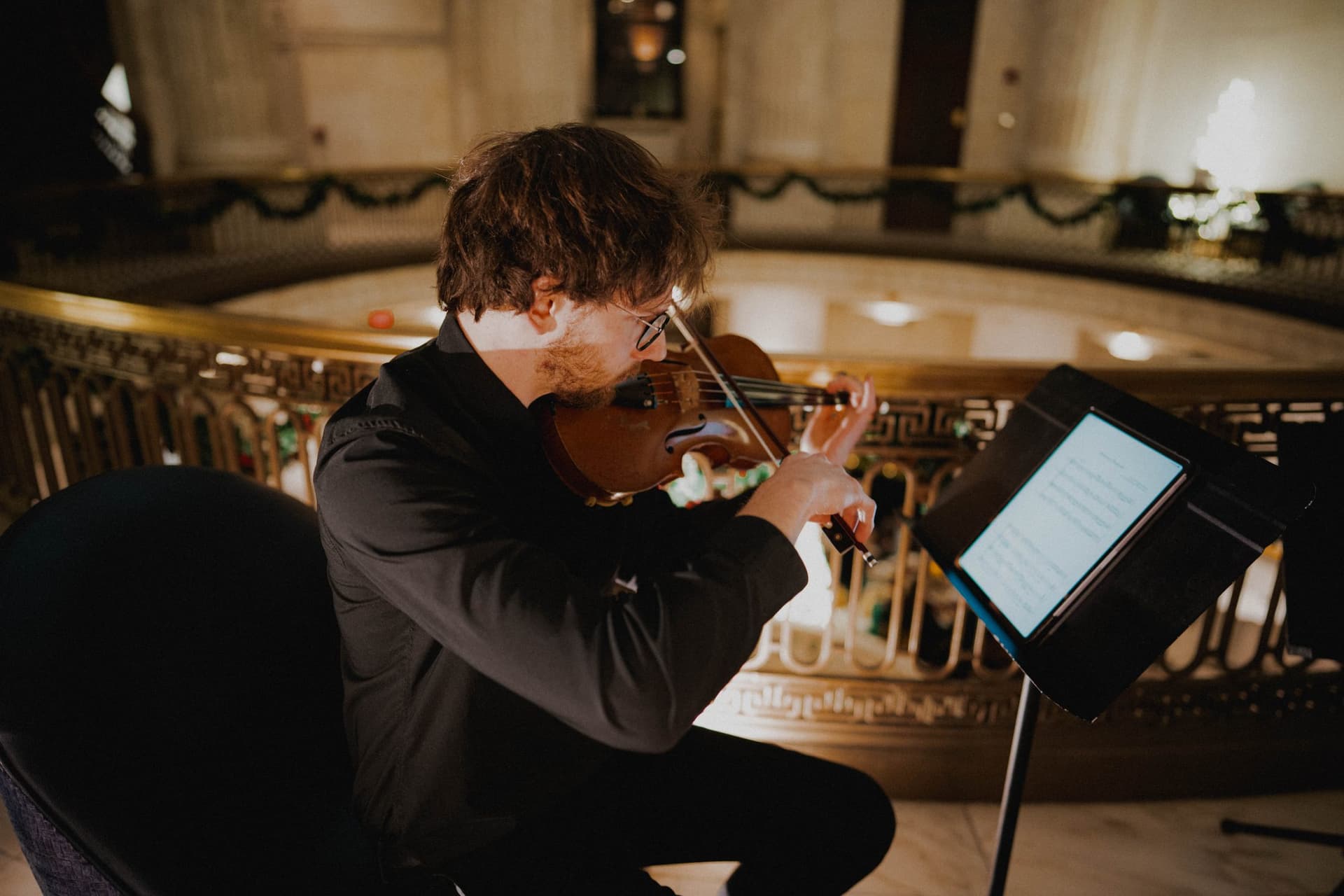 Violist performing at a winter event